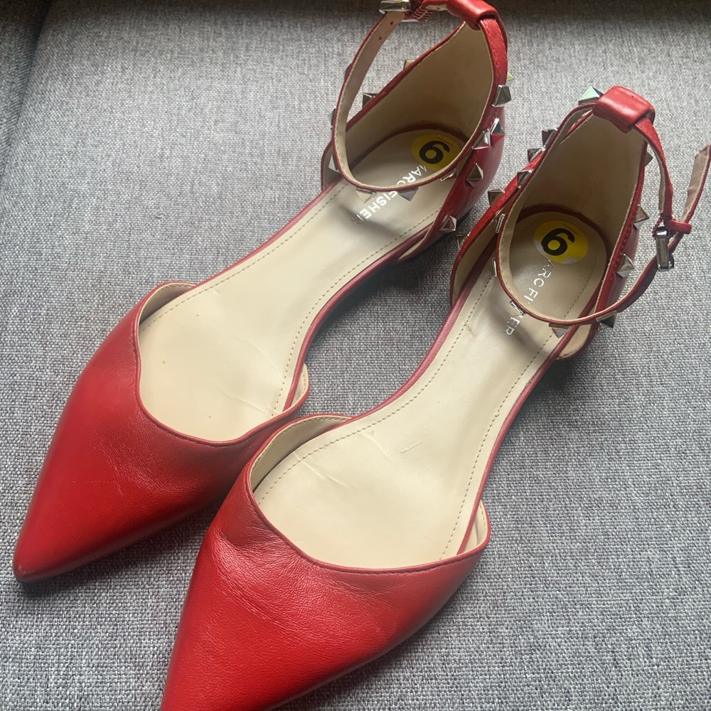 Red studded flats